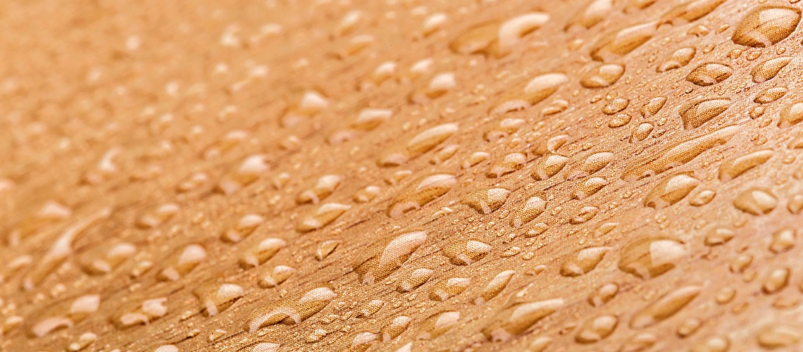 Drop of water on wooden table